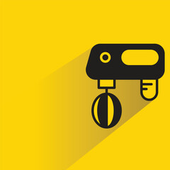 electric whisk icon with shadow on yellow background