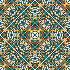 A vibrant, intricate geometric pattern featuring floral designs in multiple colors, suitable for textiles or wallpaper.