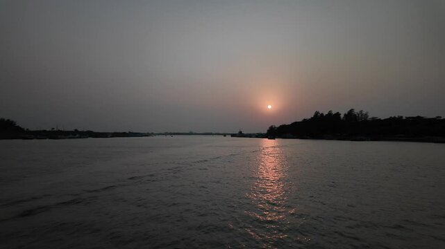 Fishing boats in the sunset in Sundarbans, Khulna Division, Dacope, Bangladesh