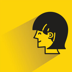 woman face icon with shadow on yellow background
