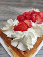 Waffle with Strawberries and Whipped Cream