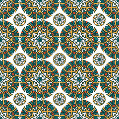 A vibrant geometric pattern featuring intricate floral and circular designs in teal, orange, and white, suitable for textiles or wallpapers.
