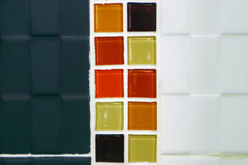 Bathroom wall tiles are installed in an unorganized manner according to standards.