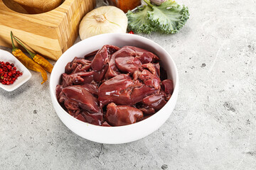 Raw uncooked chicken liver in the bowl