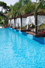 Swimming pool. Summer vacation at poolside. swimming pool in resort hotel for vacation leisure