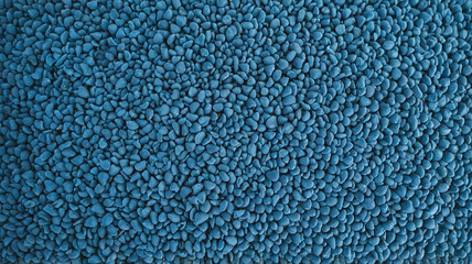 A detailed close-up of small blue gravel-like pebbles, providing a unique textured pattern for creative projects.