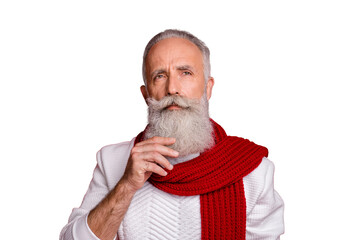 Portrait of pensive person touching his chin thinking wearing white sweater isolated over red...