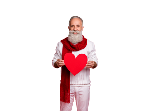 Portrait of his he nice attractive confident cheerful cheery gray-haired man holding in hands healthy heart health care medicine medicare isolated over bright vivid shine red background