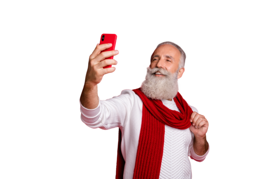 Portrait of his he nice attractive cheerful cheery confident fashionable positive gray-haired man taking making selfie posing isolated over bright vivid shine red background