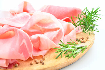 Prosciutto cotto or cooked ham in Italy on white background