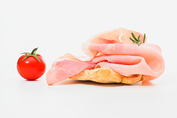 Prosciutto cotto or cooked ham in Italy on white background