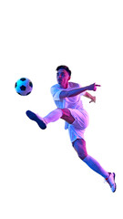 Fototapeta premium Focused football player, in vibrant neon light during training session, works on controlling ball in air, demonstrating athleticism. Concept of championship, sport events, final game. Ad