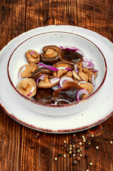 Salted pickled mushrooms.