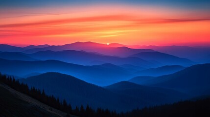 Silhouetted Mountain Ranges at Sunset with a Gradual Color Palette