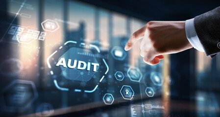 Businessman clicks Audit Auditor Financial service compliance concept