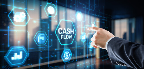 Cash flow button on virtual screen. Businessman drawing Cash Flow concept