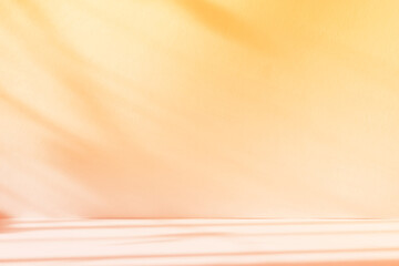 Abstract yellow color gradient studio background for product presentation. Empty room with shadows of window and flowers and plant leaves . 3d room with copy space. Summer concert. Blurred backdrop.