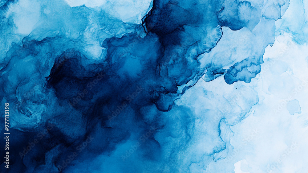 Wall mural abstract blue ink blending in water creating waves and soft clouds of color in an artistic manner