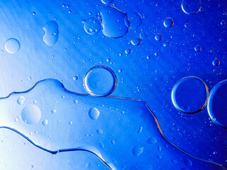 Bubbles on blue background. Abstract oxygen bubble water in sea sponge on blue background.Blue...