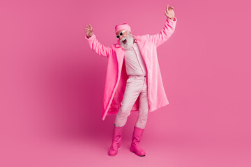 Photo of crazy eccentic senior man wear stylish bright coat boots summer glasses festive event isolated on pink color background