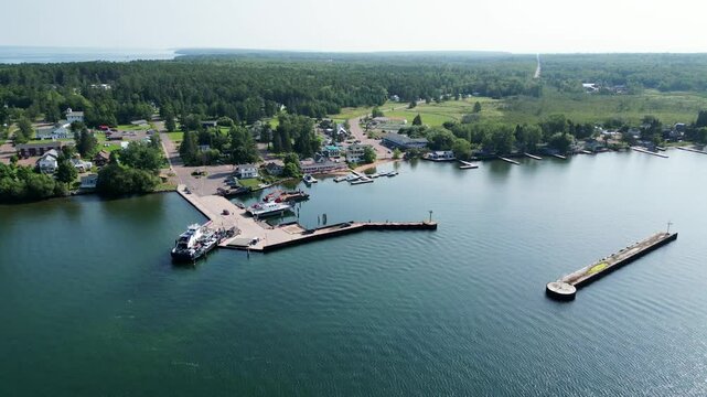Madeline Island Ferry Line On The Lakefront Town Of La Pointe, Ashland County, Wisconsin. 4K Aerial Birds Eye Reverse.