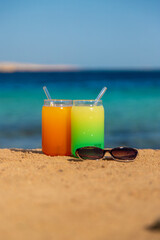 Two cocktails by the sea. Selective focus.