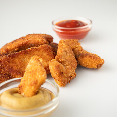 Crispy Chicken Strips with Spicy Mustard and Ketchup Sauces