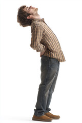 Fototapeta premium A man standing and stretching his back, expressing sense of relief and relaxation. His posture suggests moment of stretching after long day, showcasing casual attire and laid back vibe