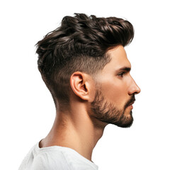 Handsome young man with trendy hair and a short beard is posing in profile on a white background
