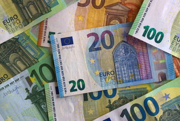 Euro money and coins close-up. The national currency of the European Union