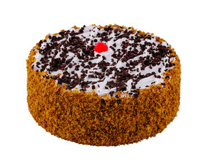 Delicious round chocolate cake with chocolate sprinkles and cherry on top isolated on white background