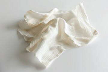 Obraz premium A close-up view of a white cloth lying flat on a table