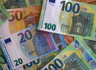 Euro money and coins close-up. The national currency of the European Union