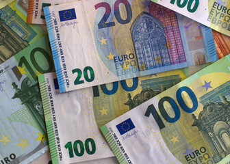 Euro money and coins close-up. The national currency of the European Union