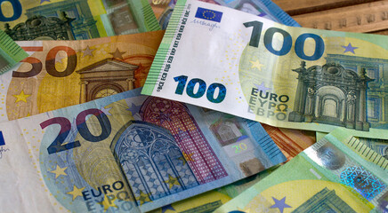 Euro money and coins close-up. The national currency of the European Union