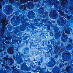 Bubbles in blue water create mesmerizing and tranquil scene, showcasing beauty of natures elements. vibrant blue hues and intricate patterns of bubbles evoke sense of calm and wonder
