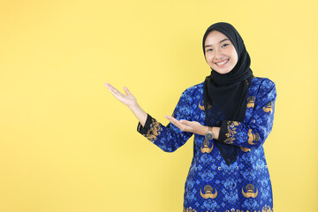 Happy Excited Cheerful Hijab ASN Indonesian WOman Pointing on the Right Side