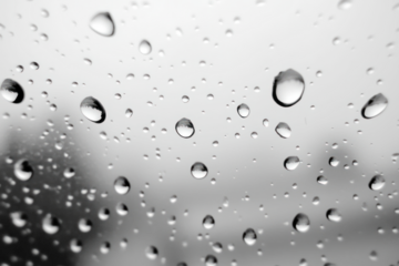 PNG Raindrops on glass background outdoors droplets.