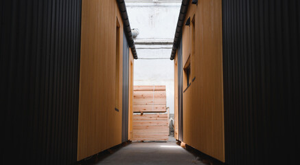 Newly built single storey prefabricated modular building. Prefabricated mobile wooden house at construction site