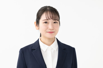 スーツを着た若い女性