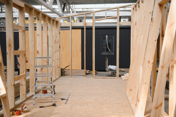 Production of new wooden modular houses. Construction site