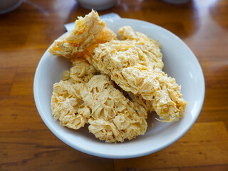 Dried crispy tofu skin for snacks or side dishes at meatball noodle stall