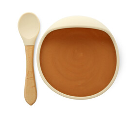 Tasty baby food in bowl and spoon isolated on white, top view