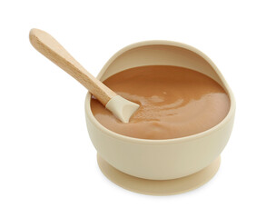 Tasty baby food and spoon in bowl isolated on white