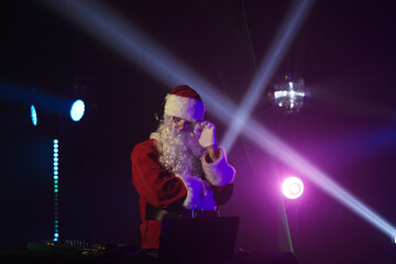 Santa Claus DJing at Christmas Party