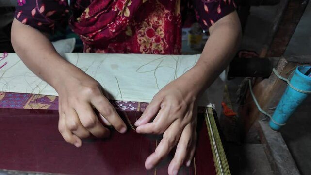 Bangladeshi people weaving in a sari factory, Dhaka, Rupganj, Bangladesh