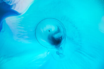 Water bubble in swirly ink environment 