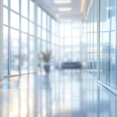 Blurred view of a contemporary office space featuring panoramic windows and soft natural light
