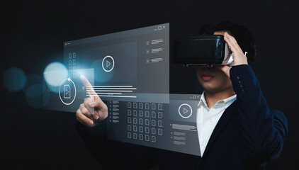 Businessman using VR virtual reality augment headset gear for analyzing future company's financial revenue, information computer system calculation storage data technology, document sharing transfer.