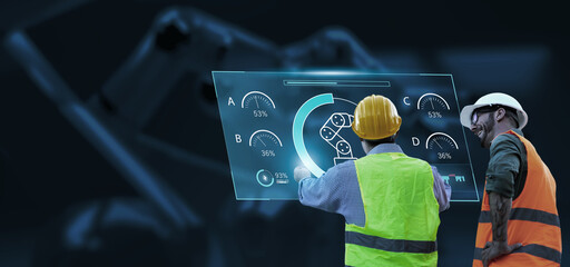 Engineering team monitoring robotic AI arms in manufacturing factory plant, partner manager teamwork using holographic ui display analysis innovation technology, male engineer, banner background.
